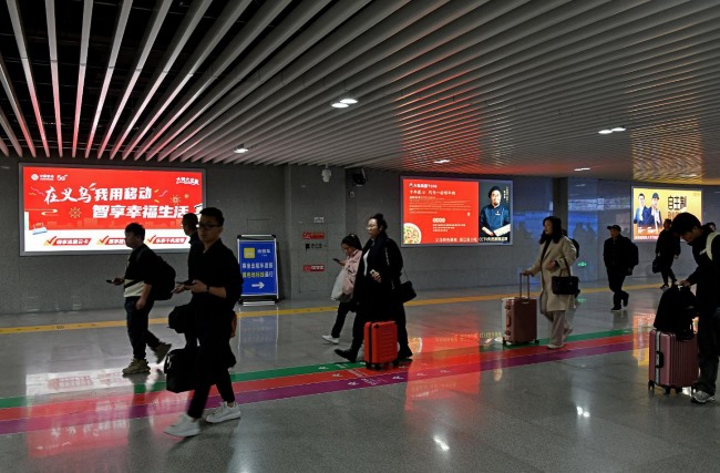 義烏火車站出站通道燈箱廣告投放，義烏站高鐵廣告價(jià)格